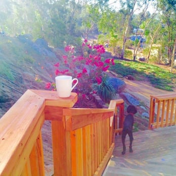 Deck Doctor - Deck was built by someone else, but Deck Doctor put the railings and handrails in. The steps are dull because they have not been stained. - Pressure Washers Near Me