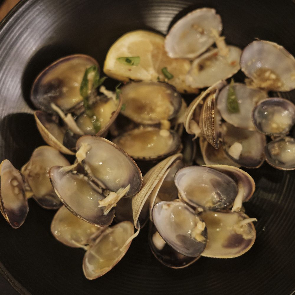 Piko Kitchen + Bar - after math of the manila clams - Cocktail Bars Near Me - Honolulu, Hawaii