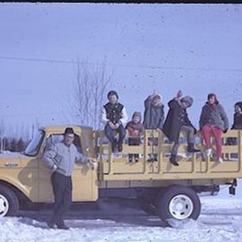 Drew Gardner Concrete & Waterproofing - a group of people sitting on the back of a truck - General Contractors Near Me - Minneapolis, Minnesota Drew Gardner Concrete & Waterproofing - a group of people sitting on the back of a truck - General Contractors Near Me - Minneapolis, Minnesota