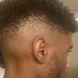 High Fade that he kept mid in the back to keep my hair long. Last time we went with a mid fade, so I greatly appreciate the feedback.