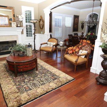Strong Wood Floors - a living room with a fireplace - Flooring Near Me - Pleasanton, California Strong Wood Floors - a living room with a fireplace - Flooring Near Me - Pleasanton, California