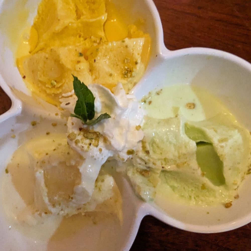 Aangara Indian Cuisine - *half eaten Kulfi Platter (Malai = beige one, Mango = orange, and Pistachio = green) homemade - Indian Near Me - Keyport, New Jersey