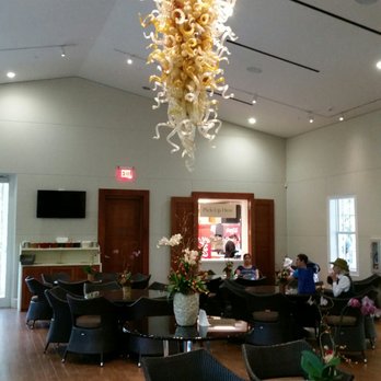 The Glasshouse Café - Chihuly chandelier with the pick up window in the background. - Cafes Near Me - Miami, Florida The Glasshouse Café - Chihuly chandelier with the pick up window in the background. - Cafes Near Me - Miami, Florida