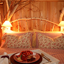 Scandinavian Escape - The (queen-sized) hand carved bed is a replica of those we saw in the farmhouses in Norway and Sweden.