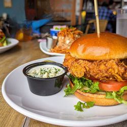 The Kosmos - The green chile cheeseburgers are great - but DON'T forget to try the best chicken sandwich in town.