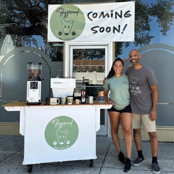 Sage's Playground - a man and a woman standing in front of a food stand - Coffee & Tea Near Me Sage's Playground - a man and a woman standing in front of a food stand - Coffee & Tea Near Me