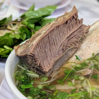Pho Duoi Bo - Closeup of the huge short rib - Vietnamese Near Me - San Jose, California Pho Duoi Bo - Closeup of the huge short rib - Vietnamese Near Me - San Jose, California