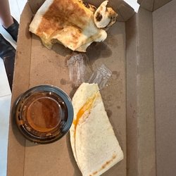 Almost finished cheese quesadilla not bad for a 9 year old.....who uses the sauce anyway...