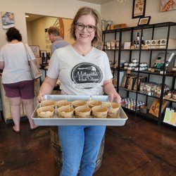 Mollycoddled Hash Slinger - The owner holding samples of her new candy.