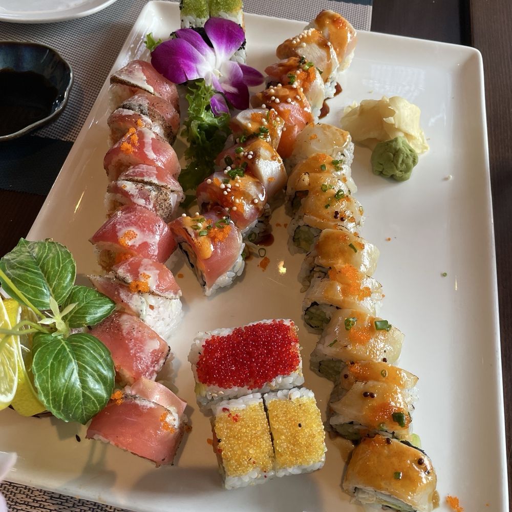 Out of Control Roll, Pacific Pearl Roll, Tuna Lover Roll, & Four Seasons Roll Out of Control Roll, Pacific Pearl Roll, Tuna Lover Roll, & Four Seasons Roll
