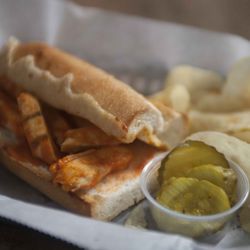 Chicago Pizza - We offer a variety of sandwiches, including a Buffalo Chicken option served with chips, pickles, and ranch or blue cheese.