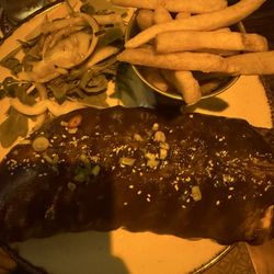 Halfway House - The meat just fell off the bone without touching. Of course, juicy indeed. BBQ Ribs and Fries. So filling!