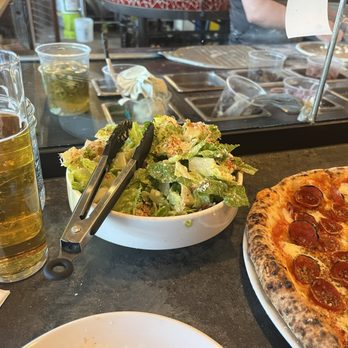Pizzicletta - Mexican lager from DSB and the Cesar salad and pizza from Pizzicletta - Pizza Near Me - Flagstaff, Arizona Pizzicletta - Mexican lager from DSB and the Cesar salad and pizza from Pizzicletta - Pizza Near Me - Flagstaff, Arizona