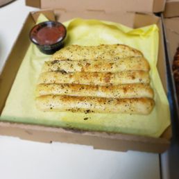 Breadsticks! Yummy! Ate one in the car already Breadsticks! Yummy! Ate one in the car already