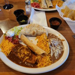 Nortenos Mexican Food - Sample plate and soft taco plate that looks like burritos or sry enchiladas.