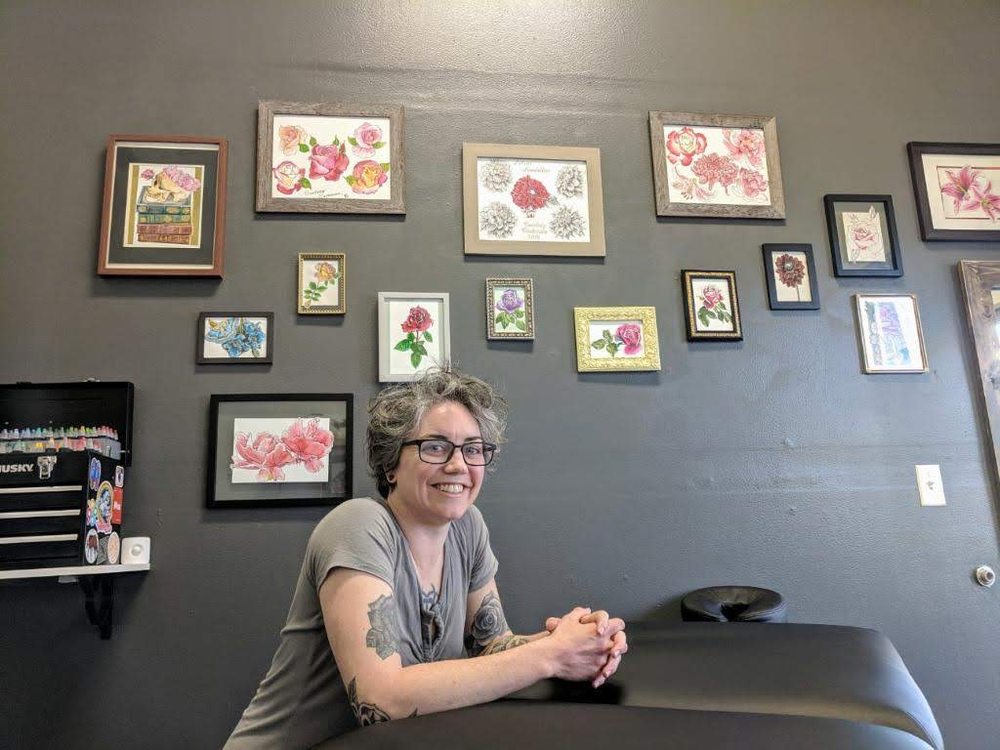 Raving Artist Tattoo Studio Logo