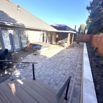 Bella Vista Landscape - The pavers are actually not too hot on the feet in the summer and he put in strip for easy drainage when i hose it off. - Landscaping Near Me Bella Vista Landscape - The pavers are actually not too hot on the feet in the summer and he put in strip for easy drainage when i hose it off. - Landscaping Near Me