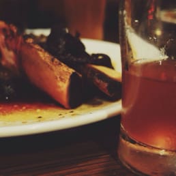 Photo of The Woolly Mammoth Alehouse - Braised beef ribs in stout with a pomegranate saison