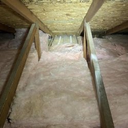 Oakes Roofing - Improperly installed baffle