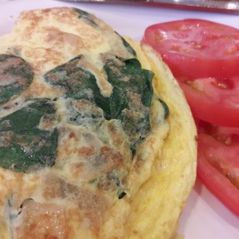 Roasters 'N Toasters North Miami Beach - Spinach, onion and swiss omelet - Delis Near Me - North Miami Beach, Florida Roasters 'N Toasters North Miami Beach - Spinach, onion and swiss omelet - Delis Near Me - North Miami Beach, Florida