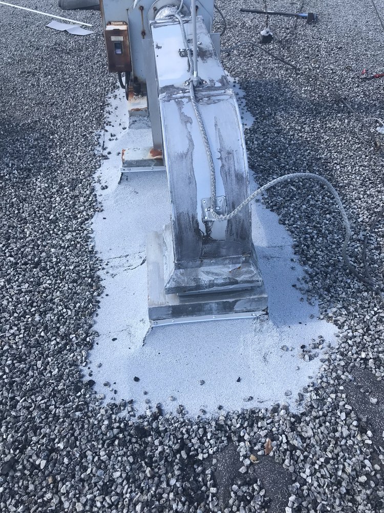 Slide of Dino Roofing Services