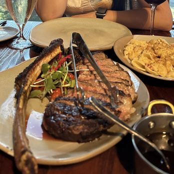 A Land Remembered - Tomahawk For Two* with Mashed Potato Lobster Macaroni and Cheese - Steakhouses Near Me - Orlando, Florida