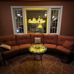 The Deland Hotel - Outside seating on the front porch.