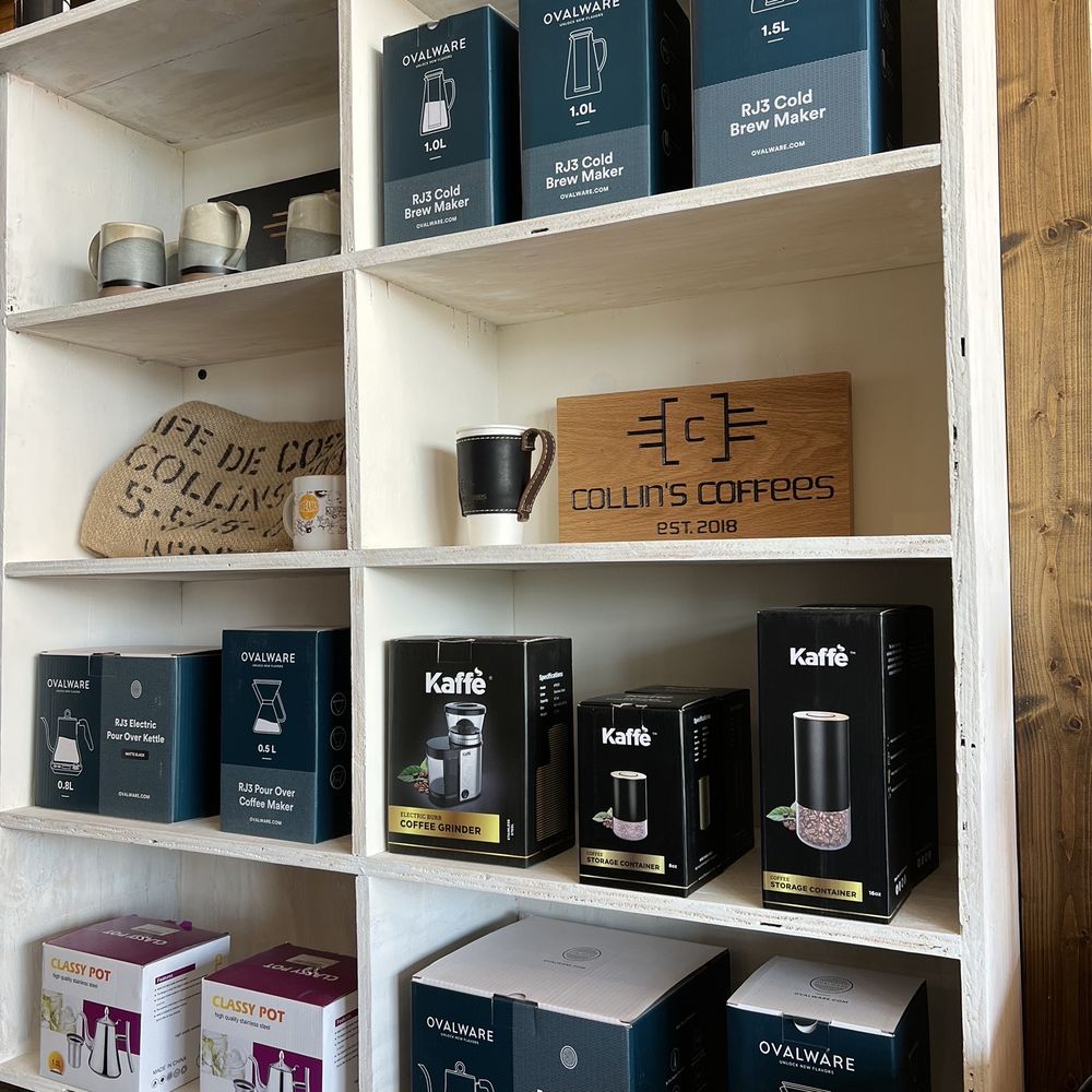 Collin’s Coffee - a shelf of coffee products - Coffee & Tea Near Me - Mauston, Wisconsin