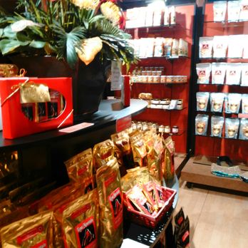 Kona Mountain Coffee - Coffee and Mac nuts display - Coffee & Tea Near Me - Honolulu, Hawaii Kona Mountain Coffee - Coffee and Mac nuts display - Coffee & Tea Near Me - Honolulu, Hawaii