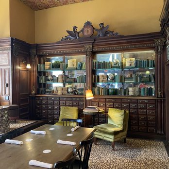 Gryphon Tea Room - The first electronic clock in Savannah with hand carved Gryphons & original drawers from the apothecary. - Tea Rooms Near Me - Savannah, Georgia
