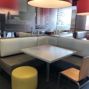 McDonald's - a table and chairs in a restaurant - Burgers Near Me - Clovis, New Mexico
