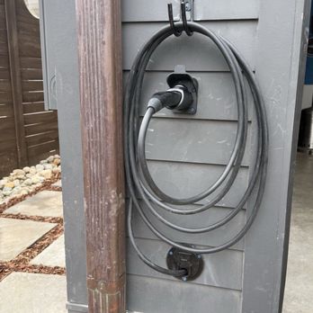 Mikes Electric - EV charger holster outside of garage. - Electricians Near Me - Murfreesboro, Tennessee