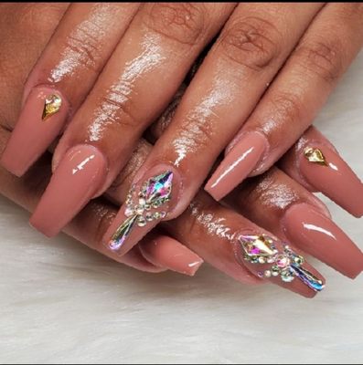 Swarovski nails - These full set are lavished with Swarovski crystals that enhances the shape and style of the nails.