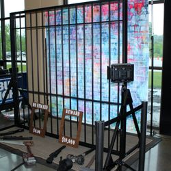 The Looking Glass Photo Booths - Our jailhouse prison bars photo booth shoot.