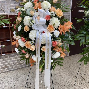 Artistic Blooms - This is one of three spectacular funeral sprays Artistic Blooms prepared for our family. Loved the color scheme. - Florists Near Me - San Antonio, Texas