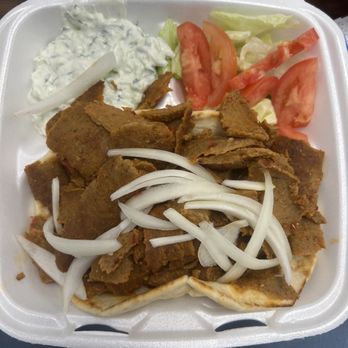 Adel's Gyros - Spicy Gyro with homemade Tzatziki sauce. - Greek Near Me - Carmel, Indiana Adel's Gyros - Spicy Gyro with homemade Tzatziki sauce. - Greek Near Me - Carmel, Indiana