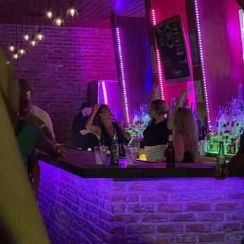 30/90 NOLA - people sitting at a bar - Bars Near Me - New Orleans, Louisiana