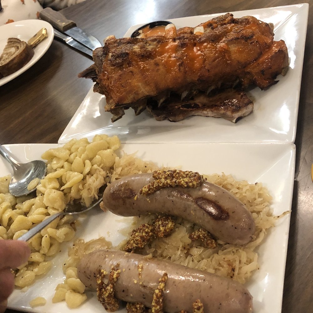 Ribs, pork chops, bratwurst, spatzel Ribs, pork chops, bratwurst, spatzel