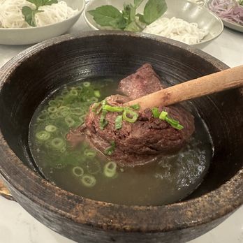 Lantern House Kitchen & Bar - Meat fall off bone in stone pot (45.00) - Asian Fusion Near Me - Reston, Virginia