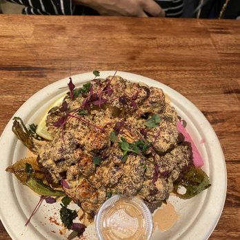 Mazra - Roasted Purple Cauliflower covered in all sorts of goodness. - Middle Eastern Near Me - San Bruno, California Mazra - Roasted Purple Cauliflower covered in all sorts of goodness. - Middle Eastern Near Me - San Bruno, California