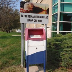 Aurora Fire Department Station 8 - Drop box for tattered American Flags south west corner of building.