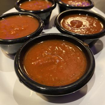 Roma Italian Restaraunt - Individual dishes of their sweet sauce for garlic bread dipping - Italian Near Me - Texarkana, Arkansas Roma Italian Restaraunt - Individual dishes of their sweet sauce for garlic bread dipping - Italian Near Me - Texarkana, Arkansas