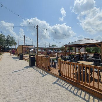 El Kourmet - an outdoor area with tables and chairs - Food Trucks Near Me El Kourmet - an outdoor area with tables and chairs - Food Trucks Near Me