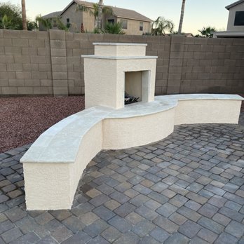 LDG Landscape - a brick patio with an outdoor fireplace - Landscaping Near Me LDG Landscape - a brick patio with an outdoor fireplace - Landscaping Near Me