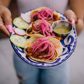 Barrio Queen - a plate of tacos with pickles and cucumbers - Mexican Near Me - Gilbert, Arizona Barrio Queen - a plate of tacos with pickles and cucumbers - Mexican Near Me - Gilbert, Arizona
