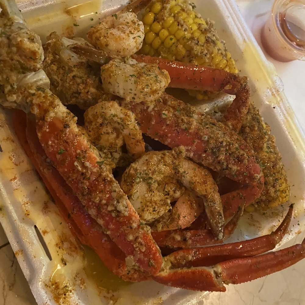 Taste Lounge - a tray of crab legs and corn on the cob - Bars Near Me - Georgetown, South Carolina