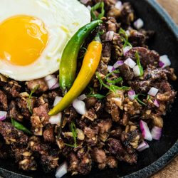 pig & fire - Sizzling sisig - crispy minced pork with a tangy lime-vinegar sauce