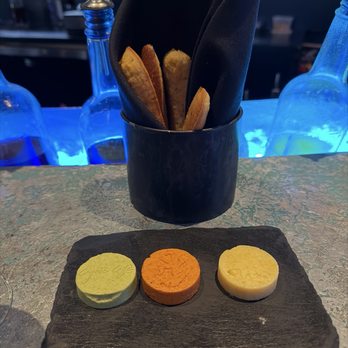 Coyote Cafe - Cornbread and flavored butters - New American Near Me - Santa Fe, New Mexico