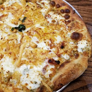 Newk's Eatery - a cheesy pizza - Salad Near Me - Canton, Georgia