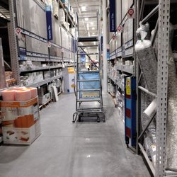 Lowe's Home Improvement - This aisle... Blocked by big metal stairs. Good luck getting to a shelf. Good luck getting a cart through. No wheelchairs allowed.